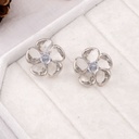 Aretes flor transparentes plateado baño 18k 