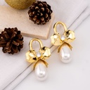 Aretes flor grande con perla dorados baño 18k