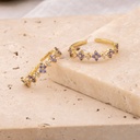 Anillo ajustable con zirconias y baño 18k