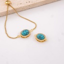 Enlace ovalado con turqueza baño 18k