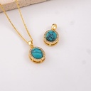 Dije ovalado con turqueza baño 18k