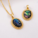 Dije ovalado con concha avalon baño 18k