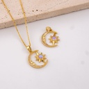 Dije sol y luna con piedra tornasol baño 18k