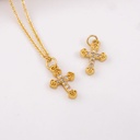 Dije cruz con zirconias baño 18k