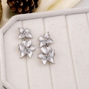 Aretes colgantes de flor esmaltados baño 18k