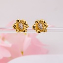 Aretes stud de FLOR con zirconias baño 18k