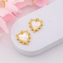 Dije corazon madre perla y baño 18k