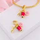 Charm costura baño 18k