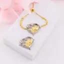 Enlace de corazón con flor baño 18k