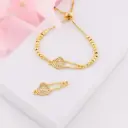 Enlace corazon con zirconias baño 18k