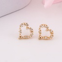 Aretes stud de corazon con zirconias baño 18k