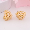 Aretes stud de corazon con zirconias baño 18k