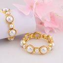 Pulsera elastica con perlas baño 18k