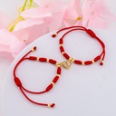 Set de pulseras de hilo ajustables con corazon de iman baño 18k