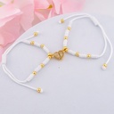 Set de pulseras de hilo ajustables con corazon de iman baño 18k