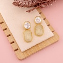 Aretes colgantes con zirconias baño 18k