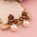Aretes colgantes de flor con perlas baño 18k