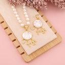 Dije VIRGEN SUYAPA con madre perla y colgantes baño 18k