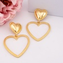 Aretes colgantes de corazon baño 18k