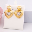 Aretes colgantes de corazon baño 18k