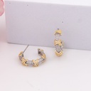 Argollas doble tono con zirconias baño 18k