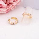 Anillo ajustable esmaltado con flores baño 18k rosa