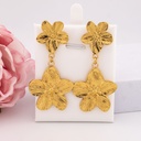 Aretes colgantes de flor en acero inoxidable