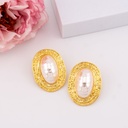 Aretes chunky ovalados con perla shell baño 18k