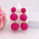 Aretes de rafia colgantes baño 18k rosa