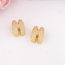 Separador de letras chunky con zirconias baño 18k