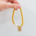 Pulsera elastica religiosa baño 18k