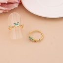 Anillo ajustable de mariposa con zirconias baño 18k