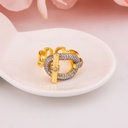 Anillo doble tono de zirconias baño 18k