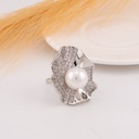 Anillo doble tono con zirconias y perla baño 18k plat