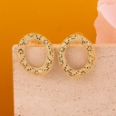Aretes ovalados con zirconias baño 18k