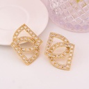 Aretes fancy con zirconias baño 18k