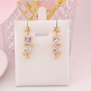 Aretes colgantes de estrellas con zirconias baño 18k