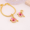 Charm pastelera baño 18k