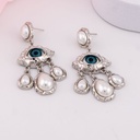 Aretes colgantes de ojos con perlas baño 18k plat