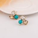 Aretes stud con turqueza y zirconias baño 18k