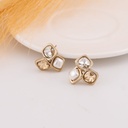 Aretes stud con perla y zirconias baño 18k