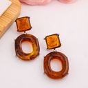 Aretes colgantes carey baño 18k