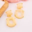 Aretes colgantes carey baño 18k