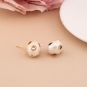Aretes stud de perlas barrocas con zirconias baño 18k