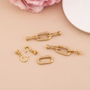 Broche con zirconias baño 18k