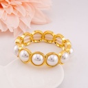 Pulsera elastica con perlas baño 18k