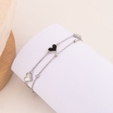 Pulsera doble de corazones baño 18k
