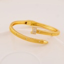 Brazalete de clavo con zirconias baño 18k