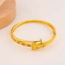 Brazalete de marca con zirconias baño 18k