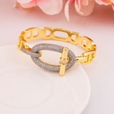 Brazalete doble tono con zirconias baño 18k